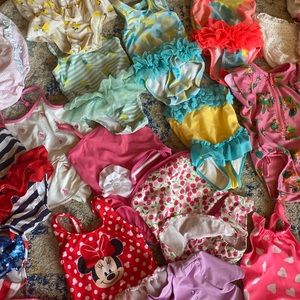 9-12 month Lot of 24 Swimsuits.